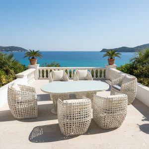 Bộ bàn ghế sân vườn 7 món nhựa giả mây trắng, phong cách hiện đại, đặt ngoài trời view biển sang trọng