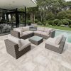 Bộ sofa sân vườn giả mây khung nhôm màu xám, nệm kem, kê cạnh hồ bơi sang trọng