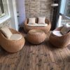 Bộ sofa sân vườn 4 món giả mây màu nâu sáng, thiết kế bo tròn độc đáo, phù hợp không gian ban công hoặc phòng khách ngoài trời