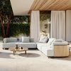 Bộ sofa sân vườn góc L hiện đại, nệm ghi sáng, bàn trà gỗ, phù hợp biệt thự ngoài trời