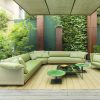 Bộ sofa sân vườn góc L hiện đại màu xanh lá non, nệm dày, bàn trà mặt kính ngoài trời
