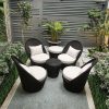 Bộ sofa sân vườn nhựa giả mây 5 món màu đen nệm trắng, thiết kế bo tròn hiện đại, đặt ngoài trời đẹp mắt