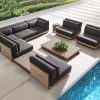 Bộ sofa sân vườn góc L khung gỗ teak, nệm xám đậm, thiết kế hiện đại cạnh hồ bơi