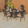 Bộ bàn ghế nhôm đúc ngoài trời 4 ghế tựa hoa văn, nệm sọc, bàn tròn có bếp nướng BBQ