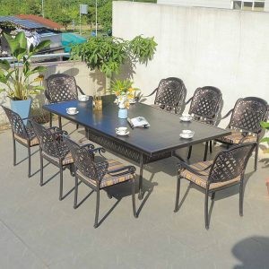 Bộ bàn ghế ngoài trời nhôm đúc 9 món với lưng ghế hoa văn mắt cáo, bàn lớn phù hợp sân vườn