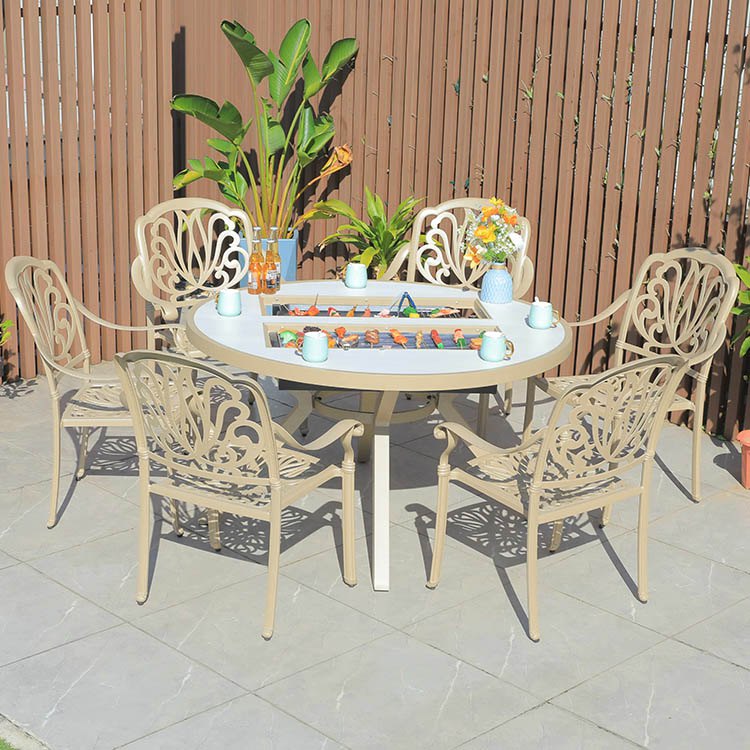 Bộ bàn ghế sân vườn nhôm 6 ghế lưng hoa văn uốn lượn, bàn tròn có bếp nướng BBQ