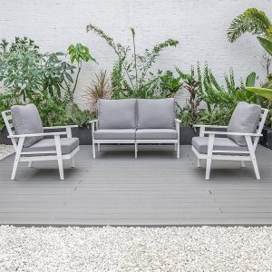 Bộ ghế sofa ngoài trời 4 chỗ, khung nhôm trắng, nệm dày màu ghi, phối cảnh sân vườn
