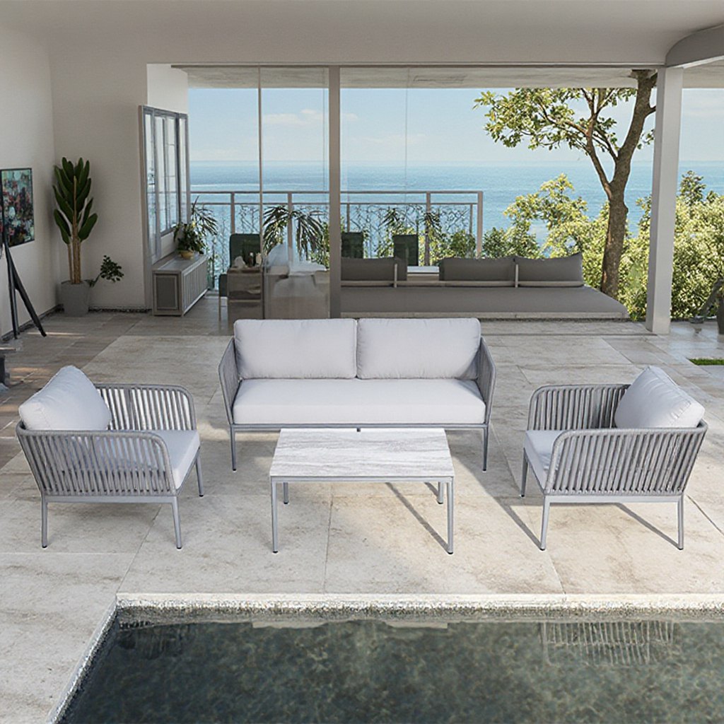 Bộ sofa ngoài trời 4 món màu ghi sáng, khung nhôm, dây đan, bàn trà mặt vân gỗ sang trọng, view biển