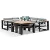 Bộ sofa sân vườn góc L khung đen, nệm xám, bàn và ghế mặt gỗ, phù hợp sân vườn ngoài trời