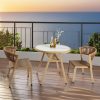 Bộ bàn ghế ngoài trời 3 món đặt trên ban công view biển, phong cách hiện đại