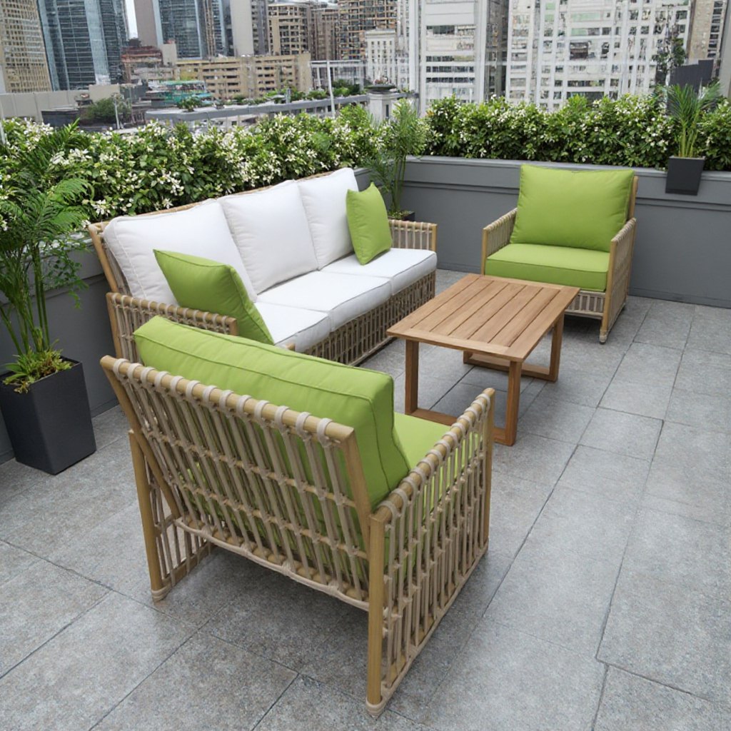 Bộ sofa giả mây 4 món với nệm dày màu trắng xanh, phù hợp không gian sân thượng