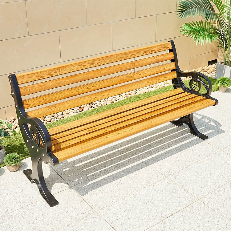 Góc nhìn trên xuống ghế băng ngoài trời nhựa giả gỗ màu vàng, khung sắt đen.
