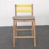Ghế bar ngoài trời hiện đại, khung gỗ teak, tựa dây vàng, nệm ghi xám đặt trên nền thảm