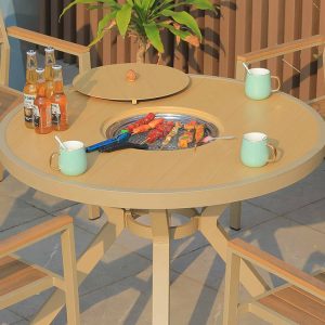 Cận cảnh bàn tròn nhôm vân gỗ tích hợp bếp nướng BBQ ngoài trời