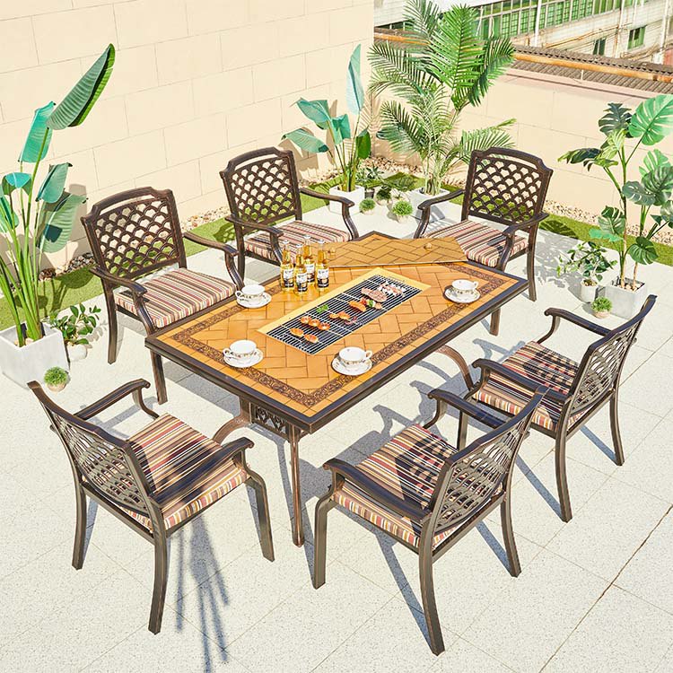 Bộ bàn ghế ngoài trời nhôm đúc 7 món, lưng ghế caro, mặt bàn họa tiết giả gạch, nệm sọc màu