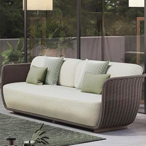 Sofa dài ngoài trời giả mây màu nâu phối nệm ghi, nhiều gối tựa xanh lá, thiết kế sang trọng